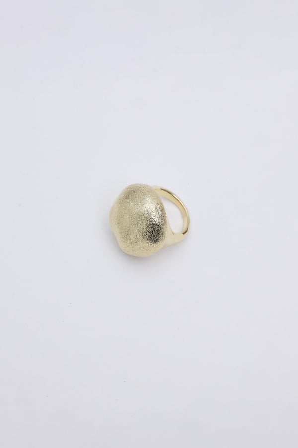 Gold oval metallic ring