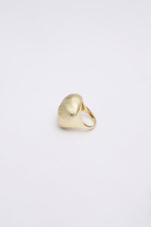 Gold oval metallic ring