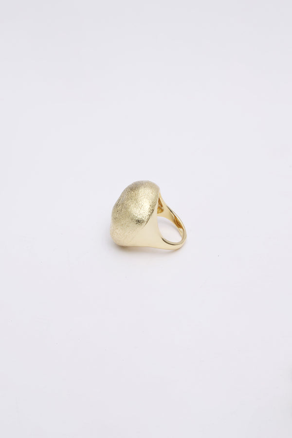 Gold oval metallic ring