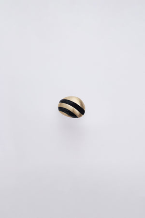Gold Sculpted dome ring with black curved stripes