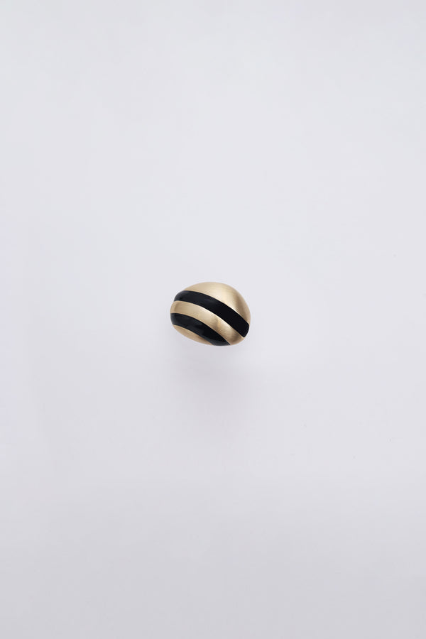 Gold Sculpted dome ring with black curved stripes
