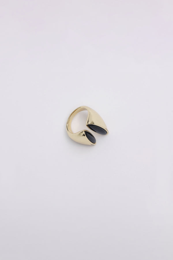 open-band ring featuring twin glossy obsidian-look accents