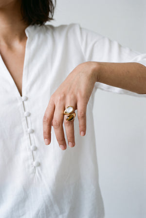 bold curved silhouette with smooth polished Ring