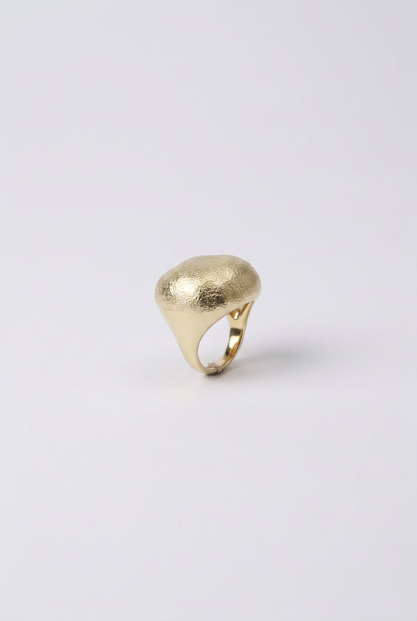 Gold oval metallic ring