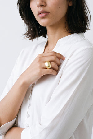 Gold oval metallic ring
