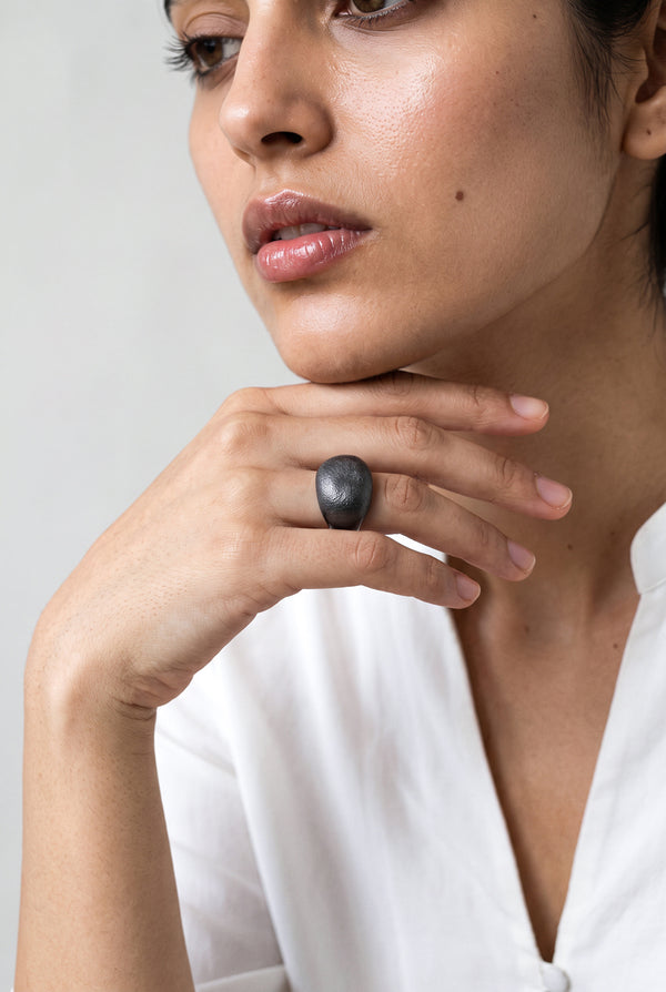 Gold oval metallic ring