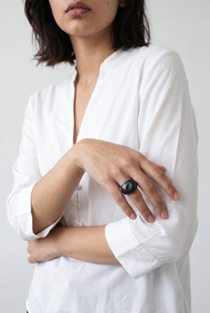 Gold oval metallic ring