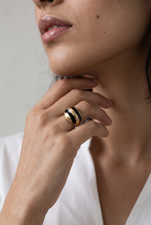 Gold Sculpted dome ring with black curved stripes