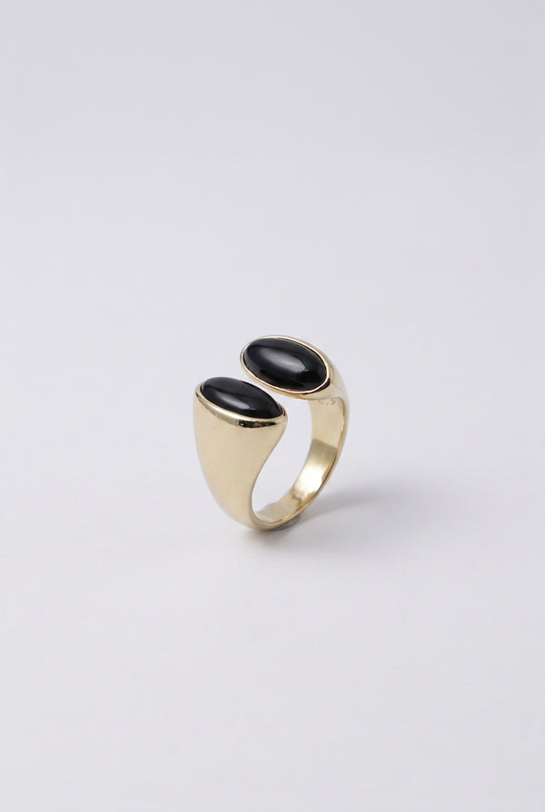 open-band ring featuring twin glossy obsidian-look accents