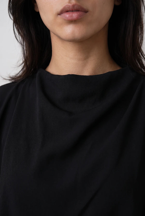 Asymmetric Layered Top