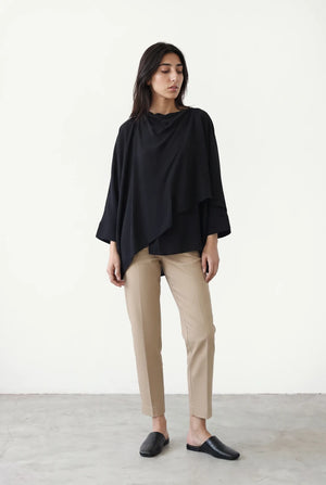 Asymmetric Layered Top