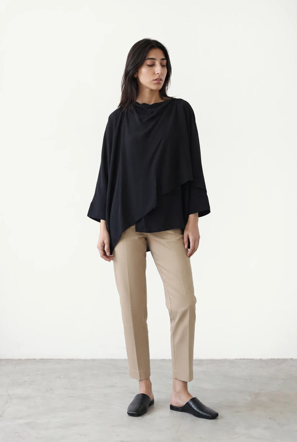 Asymmetric Layered Top